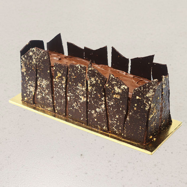 THE CREMÉ LOG
